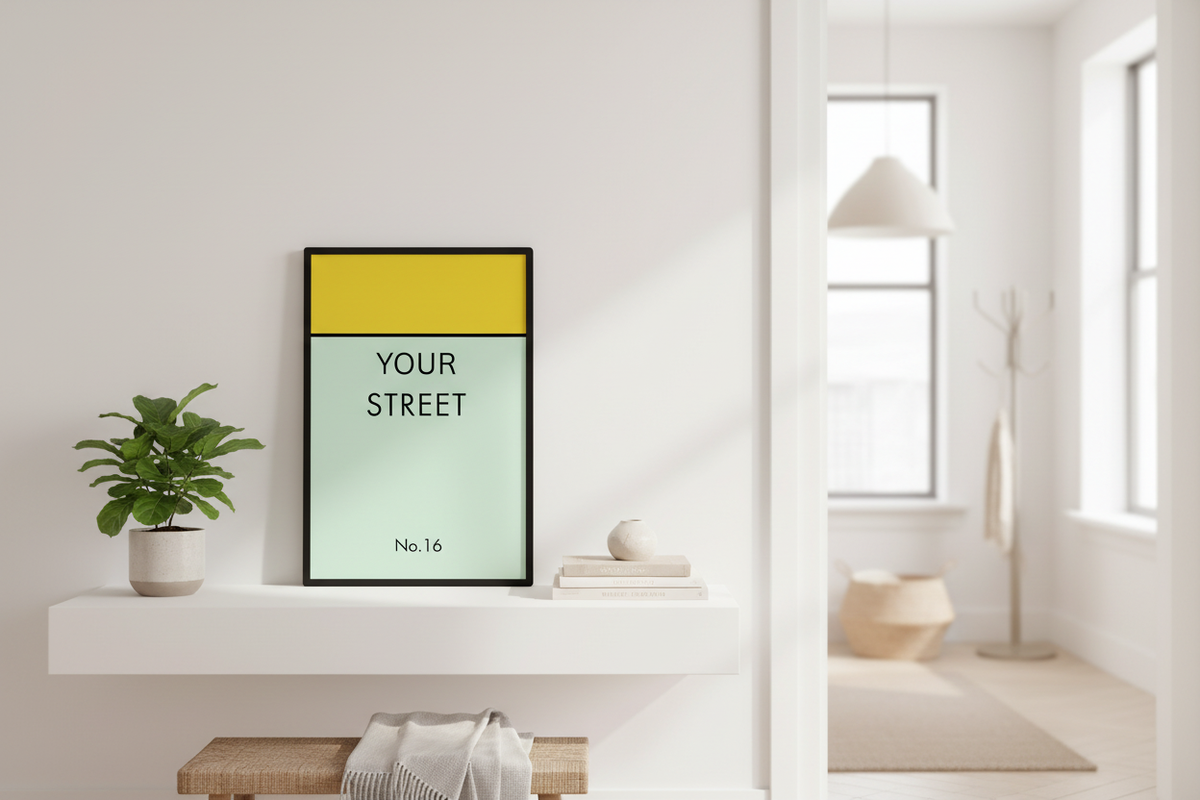 Personalized street sign print displayed on entryway console table
